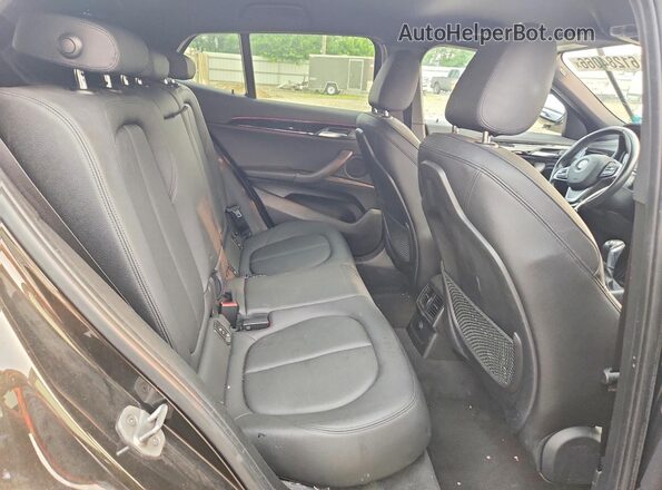 WBXYJ5C38JEB19184 2018 BMW X2 Black Սալոնի հետևի տեսք
