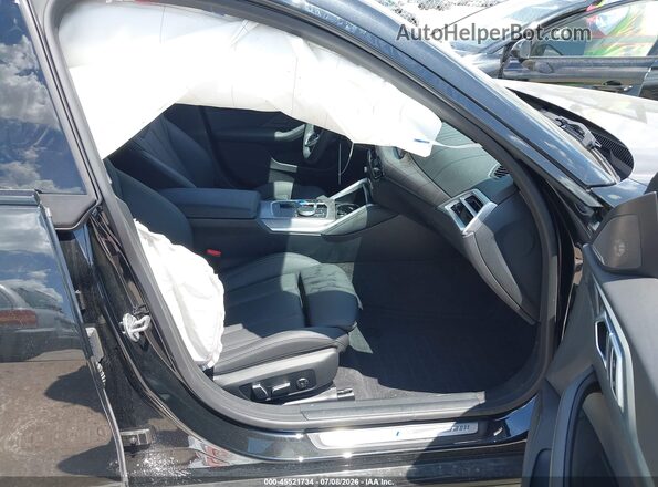 WBY23HD03SFU09472 2025 BMW I4 Black Front interior view