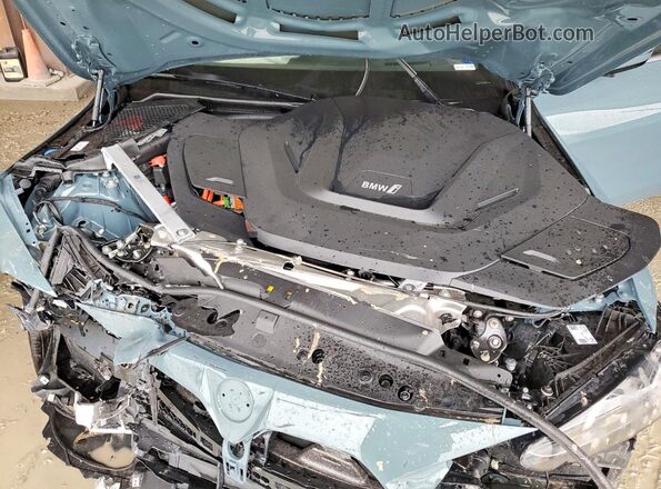 WBY23HD04SFV76388 2025 BMW I4 Teal Вид задньої частини салону