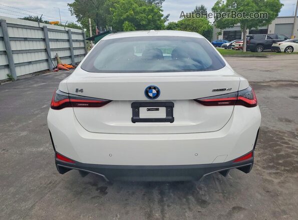 WBY23HD06SFV61214 2025 BMW I4 White Rear view
