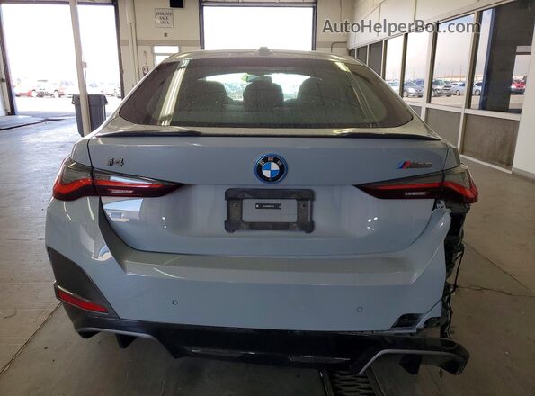 WBY33AW00RFR71378 2024 BMW I4 Серебряный Вид сзади