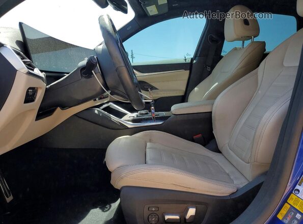 WBY33AW03RFR75330 2024 BMW I4 Blue Front interior view