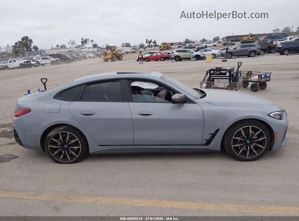WBY33AW05RFT02393 2024 BMW I4 Серый Вид задней части салона