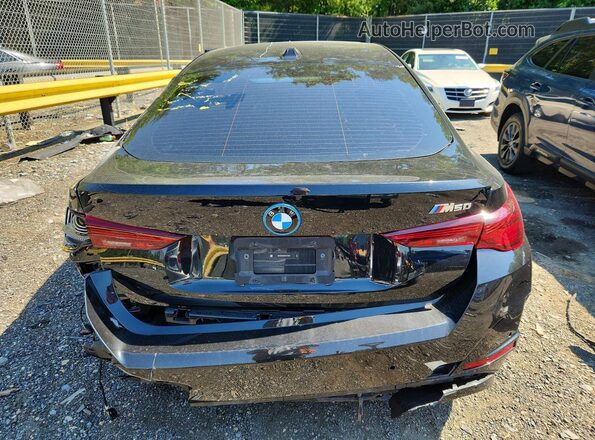 WBY33HD09SFU12994 2025 BMW I4 Black Widok z tyłu