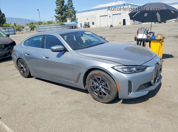 WBY43AW00RFS09950 2024 BMW I4 Серебряный Передняя правая четверть