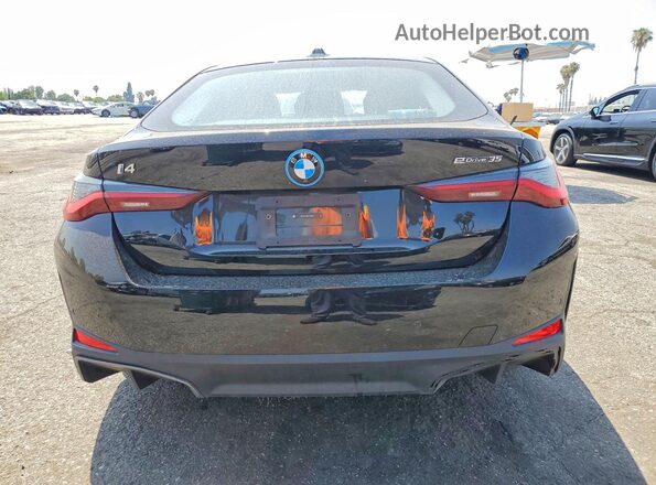 WBY43AW03RFT38250 2024 BMW I4 Black Вид ззаду