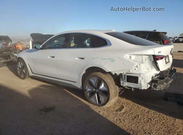 WBY43AW04RFS29537 2024 BMW I4 White Trasero izquierdo