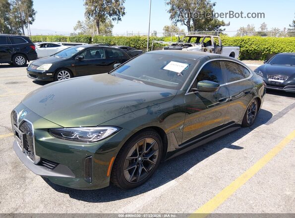 WBY43AW09RFT05771 2024 BMW I4 Зеленый Передняя левая четверть