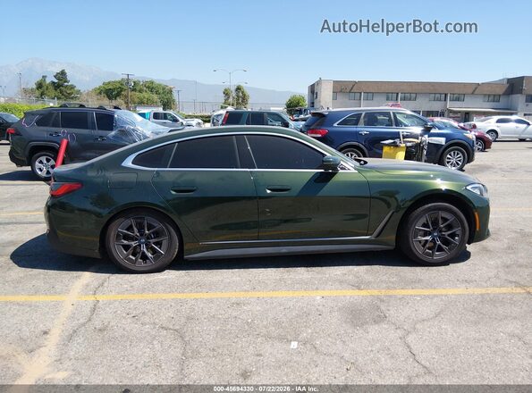 WBY43AW09RFT05771 2024 BMW I4 Зеленый Вид задней части салона