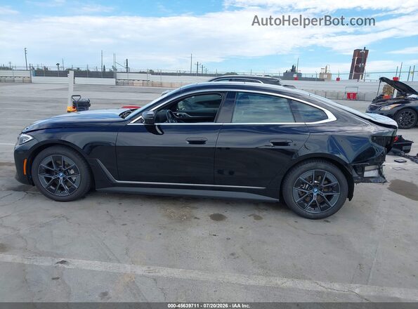 WBY43AW0XRFT29030 2024 BMW I4 Black Սալոնի 360 աստիճան տեսք