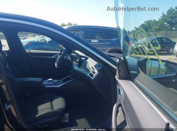 WBY43HD04SFU00630 2025 BMW I4 Black Vista interior delantera