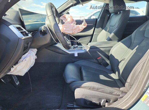 WBY43HD04SFU34048 2025 BMW I4 Green Front interior view