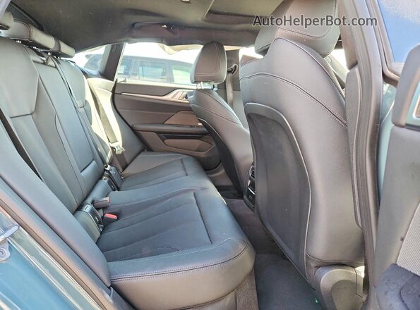WBY43HD04SFU34048 2025 BMW I4 Green Rear seats view