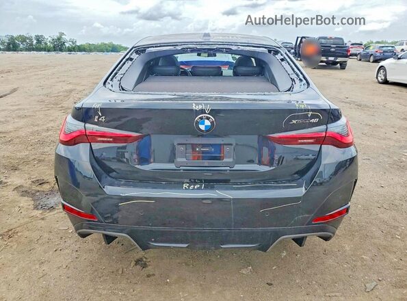 WBY43HD05TFW49911 2026 BMW I4 Black Widok z tyłu