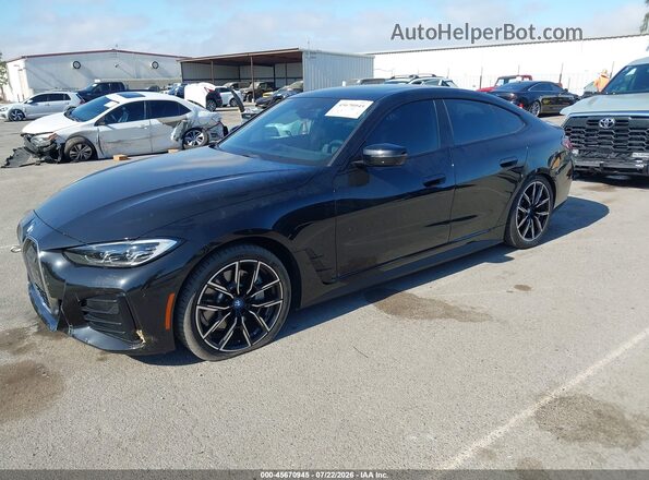 WBY73AW07PFR20474 2023 BMW I4 Black Առջևի ձախ երեք քառորդ տեսարան