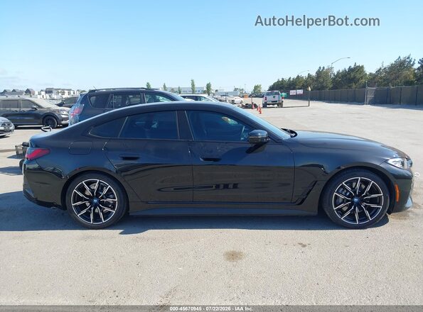 WBY73AW07PFR20474 2023 BMW I4 Black Սալոնի հետևի տեսք