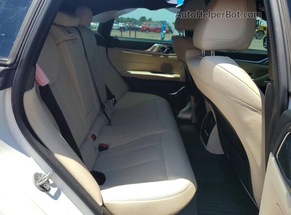 WBY73AW08RFS75434 2024 BMW I4 Pink Rear seats view