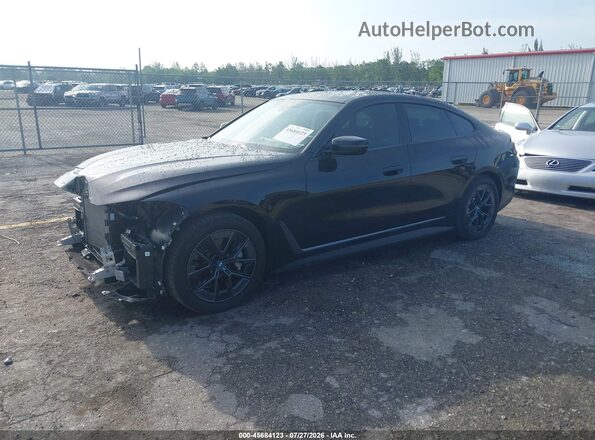 WBY73AW08RFT28357 2024 BMW I4 Черный Передняя левая четверть