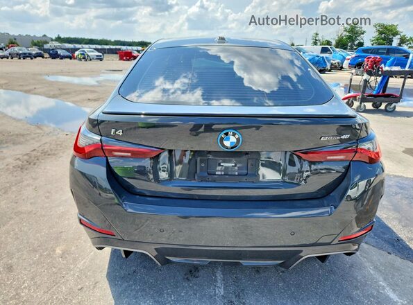 WBY73AW0XPFP87984 2023 BMW I4 Gray Հետևի տեսք