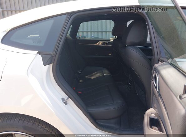 WBY83FB04RFS70609 2024 BMW I4 White VIN sticker view