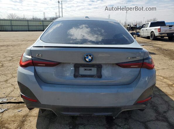 WBY83FB06RFR90154 2024 BMW I4 Blue Widok z tyłu