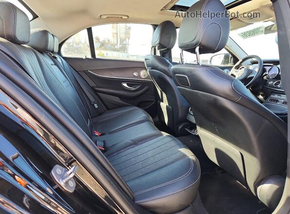WDDZF4JB7JA301573 2018 MERCEDES-BENZ E Black Vista de los asientos traseros
