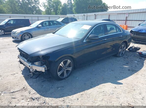 WDDZF4KBXJA340575 2018 MERCEDES-BENZ E-CLASS Black Vista tres cuartos delantera izquierda