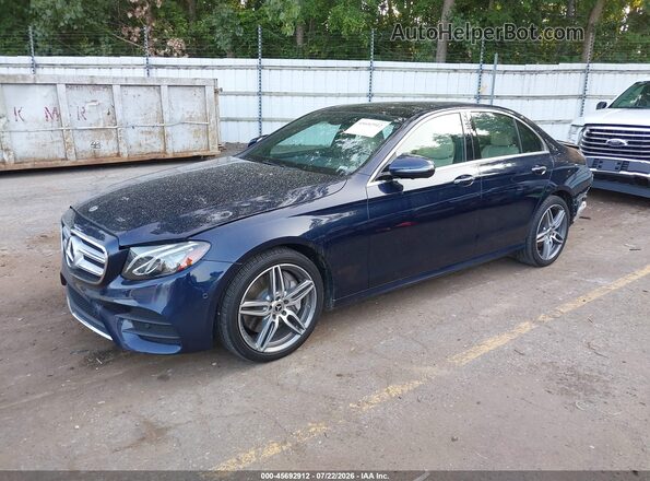 WDDZF4KBXKA674557 2019 MERCEDES-BENZ E-CLASS Navy Vista tres cuartos delantera izquierda