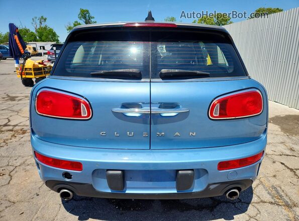 WMWLN9C36H2E50566 2017 MINI COOPER Blue Rear view