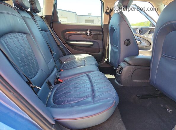 WMWLN9C36H2E50566 2017 MINI COOPER Blue Rear seats view