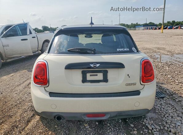 WMWXU1C5XG2D12096 2016 MINI COOPER Cream Rear view