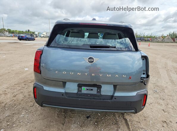 WMZ23GA04S7R18884 2025 MINI COUNTRYMAN Gray Rear view