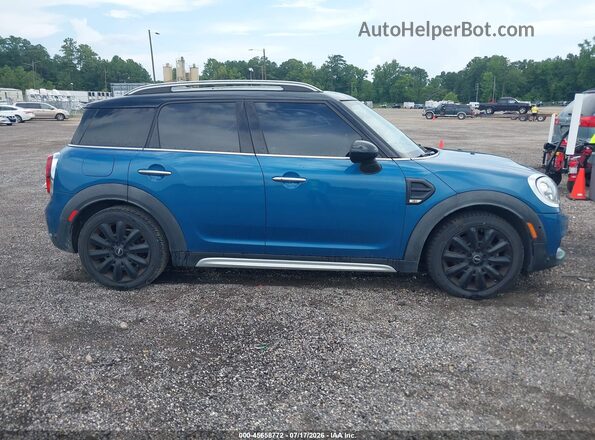 WMZYS7C37J3B63193 2018 MINI COUNTRYMAN Blue Vista interior trasera