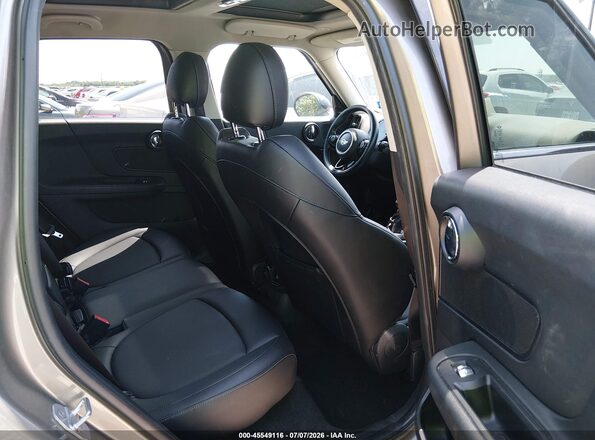 WMZYS7C38H3E06875 2017 MINI COUNTRYMAN Gray Vista de la etiqueta del VIN