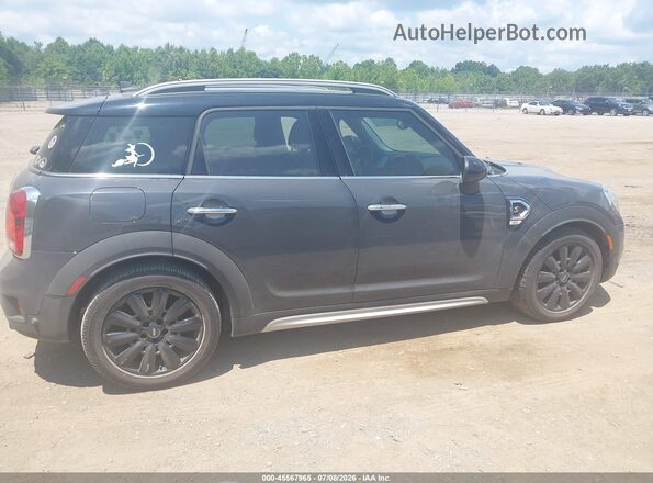WMZYT3C31J3E00394 2018 MINI COUNTRYMAN Gray Vista interior trasera