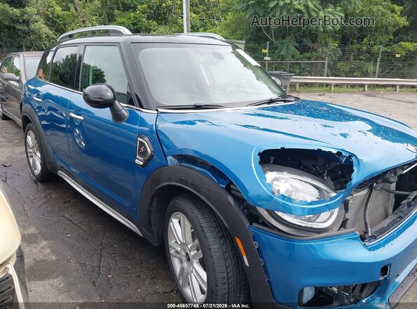 WMZYT3C36J3E93266 2018 MINI COUNTRYMAN Blue Vista interior trasera