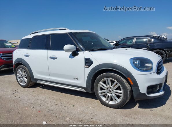 WMZYW5C03L3L14626 2020 MINI COUNTRYMAN White Vista interior trasera