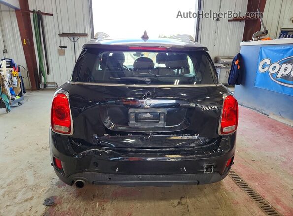 WMZYW5C06L3L15219 2020 MINI COOPER Black Հետևի տեսք
