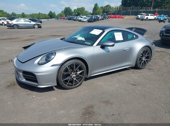 WP0AA2A90TS206843 2026 PORSCHE 911 Серебряный Передняя левая четверть