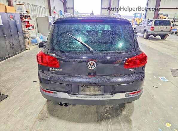 WVGAV7AX0JK002679 2018 VOLKSWAGEN TIGUAN Black Հետևի տեսք