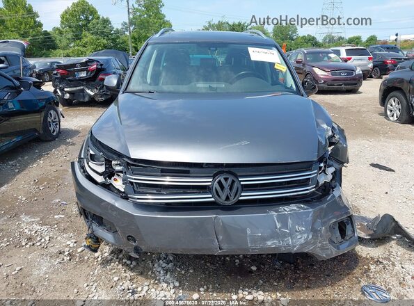 WVGAV7AX1GW557397 2016 VOLKSWAGEN TIGUAN Серый Вид щитка приборов