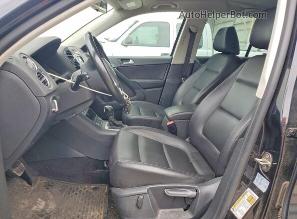 WVGAV7AX3GW542125 2016 VOLKSWAGEN TIGUAN Black წინა სალონის ხედი