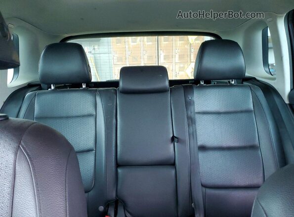 WVGAV7AX3GW588344 2016 VOLKSWAGEN TIGUAN Charcoal Vista de los asientos traseros