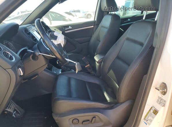 WVGAV7AX4GW074342 2016 VOLKSWAGEN TIGUAN White Front interior view