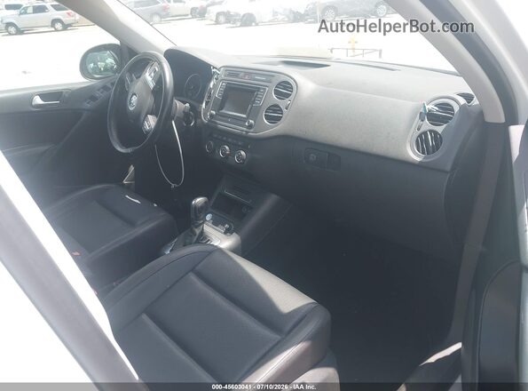 WVGAV7AX6GW559369 2016 VOLKSWAGEN TIGUAN White Vista interior delantera