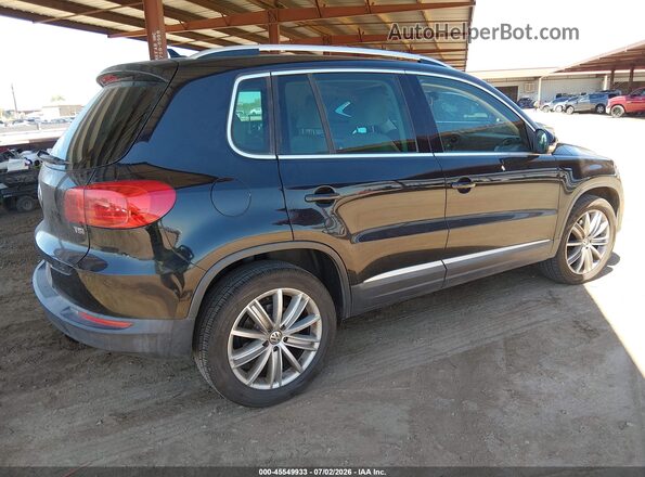 WVGAV7AX8GW501196 2016 VOLKSWAGEN TIGUAN Black Trasero derecho