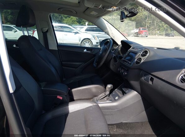 WVGAV7AX8GW517415 2016 VOLKSWAGEN TIGUAN Purple Front interior view