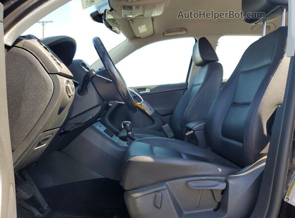WVGAV7AX8GW518970 2016 VOLKSWAGEN TIGUAN Black Vista interior delantera