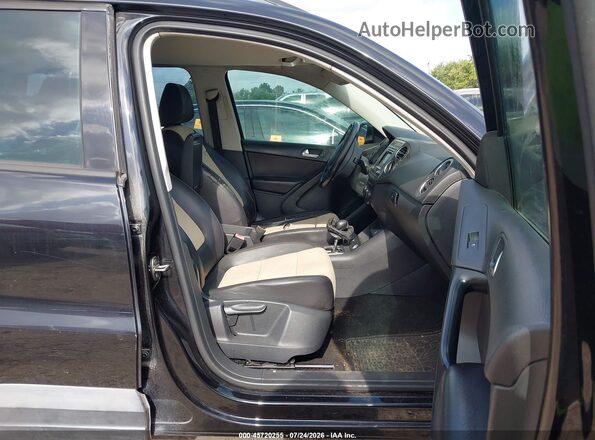 WVGAV7AX8GW589277 2016 VOLKSWAGEN TIGUAN Black Вид салону спереду