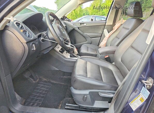 WVGAV7AX9GW610895 2016 VOLKSWAGEN TIGUAN Blue Vista interior delantera